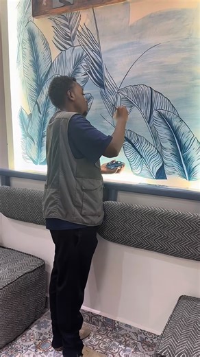 MANU on Instagram: "First time painting a mural with a brush. Respect to those who love it—because whew, not my cup of tea 😅😌. #mural #abstract"