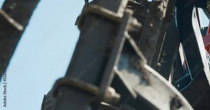 Close-up of the details of a chisel plow. Preparing the plow for loosening the soil. Deep loosening of the soil. 4K Stock Video