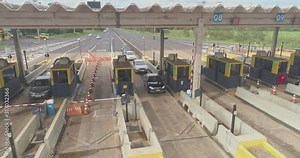 Aerial image highway toll plaza and speed limit, view of automatic paying lanes, non-stop.