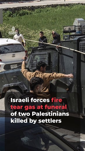 Israeli forces raided the funeral of two Palestinians killed by settlers at a school in the occupied West Bank, firing tear gas at mourners.