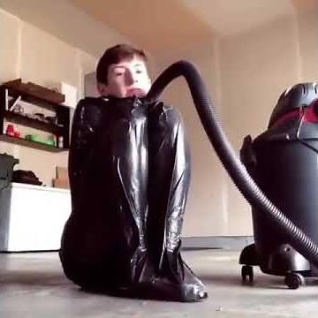 Vacuum air sealed trash bag homemade latex suit.