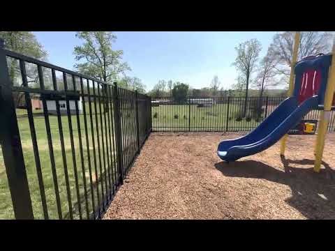 6’ tall No-Dig aluminum fence.