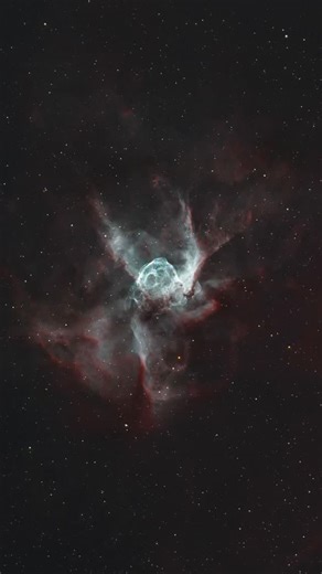 THOR’S HELMET - a bubble of ionized gas about 30 light-years wide, driven by the intense stellar winds of a massive Wolf–Rayet star roughly 15,000 light-years away in Canis Major. The expanding shell and its filamentary arcs form as supersonic winds - moving over 2,000 km/s - collide with surrounding interstellar material, generating shock waves that heat the gas to millions of degrees. This object illustrates the final, unstable phase in the life of a massive star before it explodes as a supern