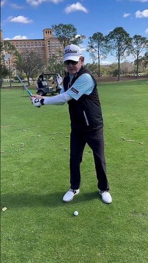 When do we use our hands to start releasing the club from the top of the golf swing?