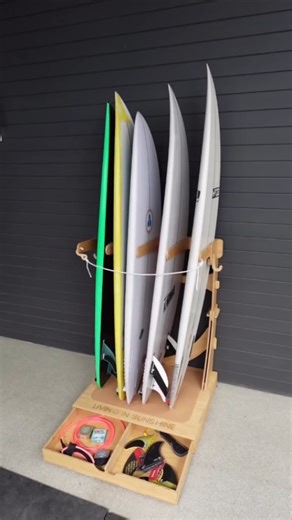 Living in Sunshine® on Instagram: "Before: boards stacked in the corner, tangled gear, chaos everywhere… wife’s mad! After: wife’s happy. Gear organized. You know where your wax is, your sunscreen’s in its place, and your boards are beautifully displayed, protected and ready for the next ride. #LivinginSunshine #surf #surfgear #surfboard #surfing #surfrack #sandiego #california #surfshop #surflife"