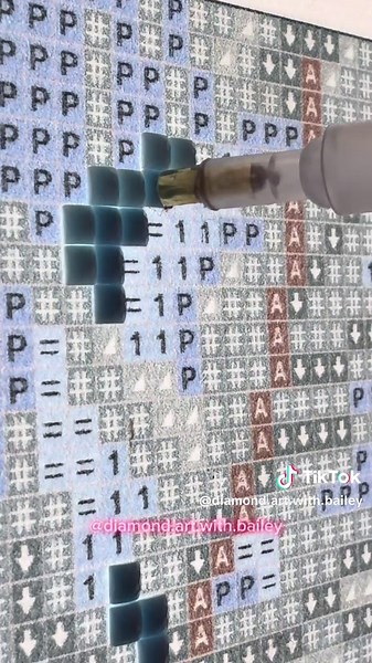 The colors on this canvas are *chef’s kiss*. So many sparkling AB drills on the snow covered roof. This painting is so easy to work on. #diamondpainting #diamondpaintingasmr #asmr #diamondart #diamondartclub