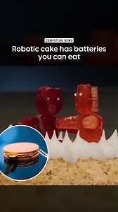 24K views · 38 reactions | Scientists have built a fully edible RoboCake—complete with the world’s first rechargeable battery you can safely eat. The batteries reportedly taste like dark chocolate followed by a surprising tangy kick, due to the edible electrolyte inside. Even the gummy robotic bears are edible. #robotics #technews | Digital Trends | Facebook
