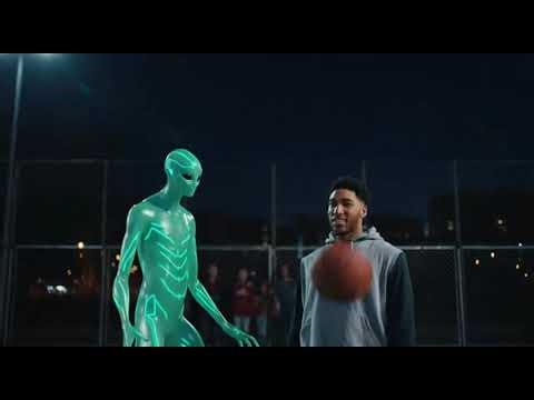 Alien playbasketball with human