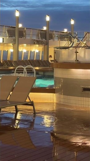 The waves were so high that water was splashing out of the swimming pool on the cruise ship