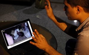 New video appears to show Libyans trying to rescue US ambassador