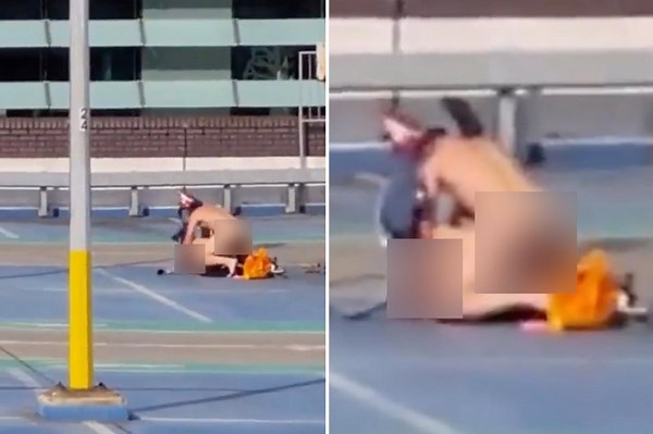 Brazen couple caught having sex on city rooftop during heatwave