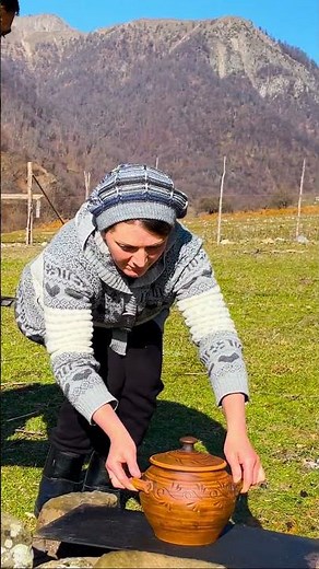 Clay Pot Stew: Traditional Cooking Over Open Flame