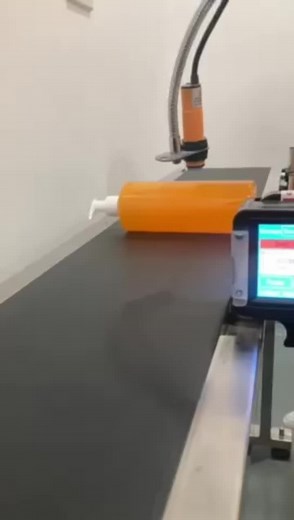 Filling Plastic Bottles in Industrial Setting