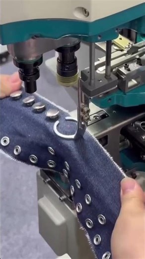 Snap button hole machine