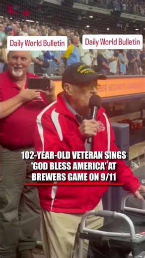 A 102-year-old World War II veteran sings "God Bless America at Brewers game on 9/11.