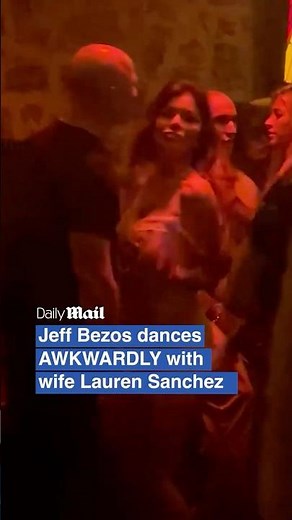 Jeff Bezos and Lauren Sanchez dancing awkwardly together in Ibiza club
