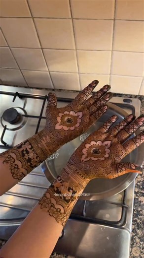 l've been using clove and water steam as part of my henna aftercare for the past four years, and honestly, I can never imagine skipping this step now. Steaming the mehndi after it's fully dried helps bring back moisture to the paste. When you use steam made from cloves and water, it softens the dried henna just enough to re-activate the dye. This "wakes up" the stain again, giving it a chance to darken and deepen even more. That's why I always recommend this to all of my brides not just once, bu