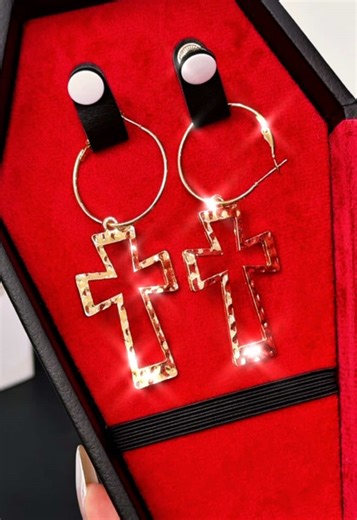 These gold cross earrings? Yeah... they re the statement piece you didn’t know you needed. They make the perfect gift if you’re looking for a gift for somebody for Christmas or keep it for yourself. They go with just about anything and just darling! #CrossEarrings #DangleEarrings #GoldEarrings #TikTokMadeMeBuylt #jewelrytok