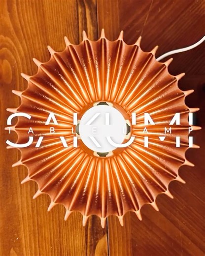 Charles-Henry Regaud on Instagram: "SAKUMI | 3D printed table lamp 100% vase-mode print, both shade & base! Comment “STL” and I’ll send you the link. I aimed to design a lamp in which is both the shade and the base could be printed in vase mode. The challenge was to give the shade a sense of volume despite the constraints of vase-mode printing, creating the impression of subtle outward and inward curves, even though it is formed from a single 0.8 mm wall. The result is the SAKUMI lamp, compatibl