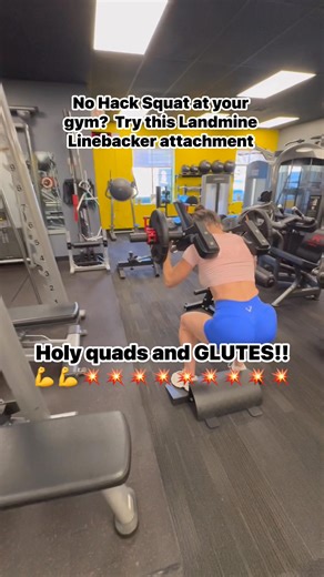 If you don’t have access to a hack squat-try this landmine attachment that mimics a hack squat. I also elevated my heels as well. In this landmine hack squat variation, your torso stays more upright, reducing stress on the lower back and keeping constant tension on the glutes and quads through the full movement. It’s an excellent way to build lower body size and strength when you don’t have access to a hack squat machine. | Erin McDermott