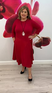 5.7K views · 116 reactions | Just in.. This gorgeous red dress is a fabulous shape and a wow colour! ❤️ Great quality, stretchy, aline shape, flattering midi length and a front pocket. Size 16 to 26, €140 with free delivery. If you would like help with sizing, fit or to place an order, feel free to call the girls on 0404 42537 (Ashford) or 053 9483675 (Gorey), as they would be happy to help | Wardrobe Plus sizes 16 to 26 | Facebook
