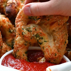Cheese-Stuffed Garlic Parmesan Pretzels Recipe by Tasty