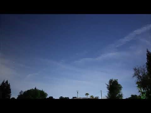 Night Sky Time Lapse with a quick view of a Rocket Launch at the 3:49 look for the short palm tree