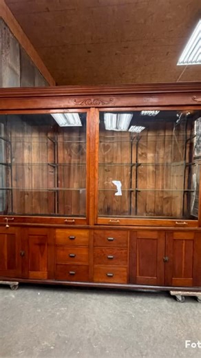 We just salvaged this stunning antique store display cabinet from a historic building in Effingham, Illinois. The glass display doors slide upward toward the ceiling… a rare and ingenious early retail design meant to maximize floor space and visibility. DM if interested. ▪️Payson, IL ▪️Nationwide shipping ▪️TheOldGrainery.com #antiquedisplaycabinet #storefixture #architecturalsalvage #vintagecabinet #theoldgrainery #retaildisplay #vintagefurniture #interiordesign #vintagelovers #vintagestyle | T