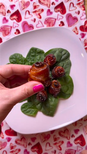 🌹 Bacon Roses 🥓 Because flowers are nice… but bacon is better 😏 How to make them: 1️⃣ Preheat oven to 400°F 👉 Optional crispy tip: Pre-bake bacon strips for 5 minutes 2️⃣ Place a rack on a sheet pan and lay bacon strips on top Sprinkle with brown sugar a pinch of chili powder, pressing it in so it sticks 3️⃣ Flip the bacon over and roll it up into a rose shape Secure the bottom with a toothpick 4️⃣ Brush the tops with maple syrup 🍁 5️⃣ Bake for 35–40 minutes until caramelized and irresistib