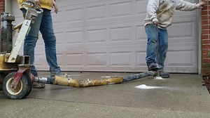 Watch and be amazed! 朗 Our crew is lifting this driveway to eliminate that dangerous tripping hazard right where the concrete meets the garage floor. Another smooth transition created, another Happy Customer made safe! That's the Affordable Concrete Raising difference. Ready to make your driveway safe? Contact us today!  #TrippingHazardRemoved #DrivewayRepair #ConcreteLifting #SafetyFirst #AffordableConcreteRaising #HappyCustomer | Affordable Concrete Raising. | Facebook