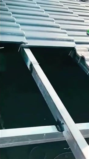 Applying sealant beneath metal roofing panels for watertight installation