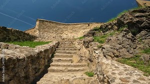 Rupea, Romania 04.09.2025: Exploring the Medieval Inner Courtyards and Walls of Rupea Citadel, a Saxon Fortification in Brașov County Stock Video