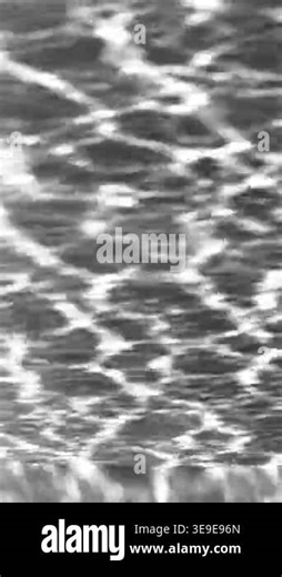 The abstract reflection of rippled water creates dynamic patterns of light on the concrete wall, capturing movement, texture, and the interplay of natural light Stock Video Footage - Alamy
