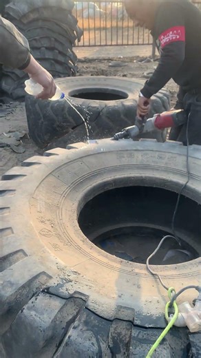 Cutting up old tires for recycling