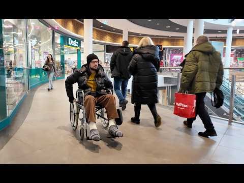 Andy Double short leg cast - wheelchair trip to shopping center