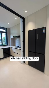 Hidden sliding door to separate your kitchen from your dining room whenever you want, these can be customized according to your space by any local glass company or contractor ••••• #slidingdoor #openkitchen #diningroom | Tiffany Design Studio