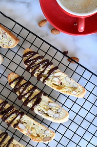 How to Make Italian Almond Biscotti (Cantucci)Who’s ready for some dunking?!? 😍Crunchy, nutty, and perfectly dunkable! These homemade Italian almond biscotti, or cantucci, are a classic treat perfect for the holidays or any occasion. Pair them with a steaming cup of coffee, tea, or a glass of sweet vin santo for a true taste of Tuscany. 🇮🇹🤌🏻❤️Ready to bake your own batch? Here is my recipe for you 😘 INGREDIENTS* 4 large eggs* 3/4 cup (150 g) sugar* 4 oz (55 g) unsalted butter, melted* 1 te
