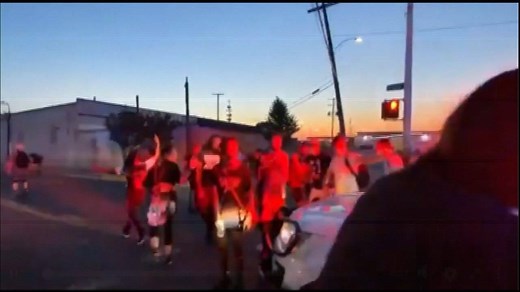 A Detroit Police SUV was surrounded by demonstrators when the driver accelerated through the crowd - carrying several people on the hood. MORE: https://bit.ly/3dPyhMA | FOX 2 Detroit