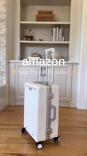 this ✨New ✨ carry on suitcase has a built in charging system, a phone stand, front compartment for laptop, cup holder, hooks and TSA locks🥵 It comes in white, grey, black and sizes range from 18-24 inch so should be carry on approved by most airlines. Find this in bio link under travel essentials 😃 #amazonfinds #travelessentials #travelorganizer #packwithme #travelfavorites
