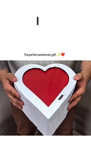 netflix.decode on Instagram: "- The post showcases a heartfelt DIY anniversary video where a couple lights a heart-shaped box to reveal a flaming photo collage of their 12-month memories, symbolising their first year together. - Posted by content creator rarazxxy in response to a request for interesting videos, it has exploded in popularity with 8.6 million views and 11,700 likes, drawing admiration for its romantic creativity. - Replies highlight its emotional resonance, aligning with psycholog