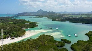 Ile aux Cerfs island with idyllic beach scene, aquamarine sea and soft sand, Ile aux Cerfs, Mauritius, Indian Ocean, Africa. Ile aux Cerf in Mauritius, beautiful water and breathtaking landscape.