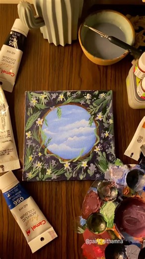 A little sky window surrounded by flowers 💙🌸 #AcrylicPainting #ArtReel #minicanvas #skyart #shots