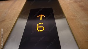 Movement of elevator up. The LCD screen shows countdown from one to thirty-six floors. elevator screen counts from 1 to 36. elevator cabin inside rises up. the interior of the elevator in the hotel.