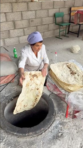 Armenian traditional bread Lavash baking by experienced women