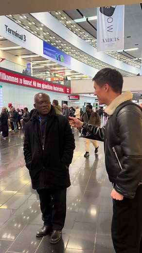 Nigerian Man Speaking Portuguese at Airport