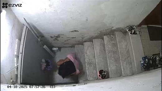 Woman slips while descending stairs in Naples, Italy