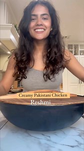 Follow @rookiewithacookie for more recipes My brother’s favorite Creamy “Reshmi” Chicken is so delicately spiced you’ll keep coming back for seconds! Ingredients: 1/3 cup oil 1 lb chicken thighs, cut in small pieces 1/2 tsp salt 1 tsp ginger garlic paste 2 tbsp yogurt, beaten 1 tsp ground coriander 3/4 tsp ground cumin 3/4 tsp ground white pepper 1/4 tsp ground nutmeg 1 green bell pepper, julienned 1 cup heavy cream 1/4 cup mozzarella cheese 1/2 tsp black pepper 2 tbsp butter 1 green chili, slit