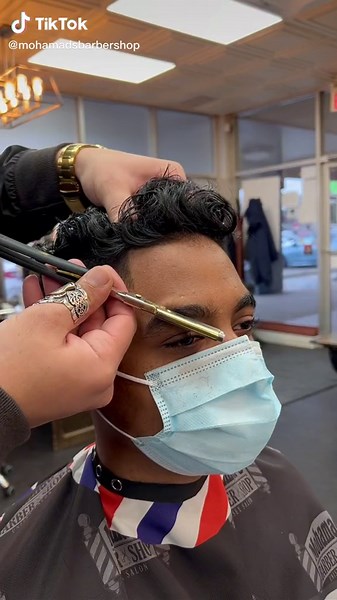 Expert Barber Styling Techniques in Action