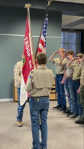 The Pledge of Allegiance at Boy Scout court of honor.