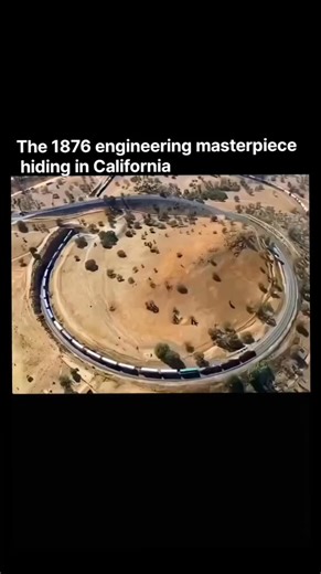 StartUpSphere on Instagram: "Most people drive past it without knowing what they’re missing. The Tehachapi Loop is a railway spiral that makes trains pass over themselves to climb mountains. Built in 1876, it’s a 0.73-mile curve that gains 77 feet in elevation while keeping the grade manageable. Long freight trains literally cross over their own tracks. The engine passes above the rear cars of the same train. Nearly 40 trains use this loop every single day. A 150-year-old solution that still wor